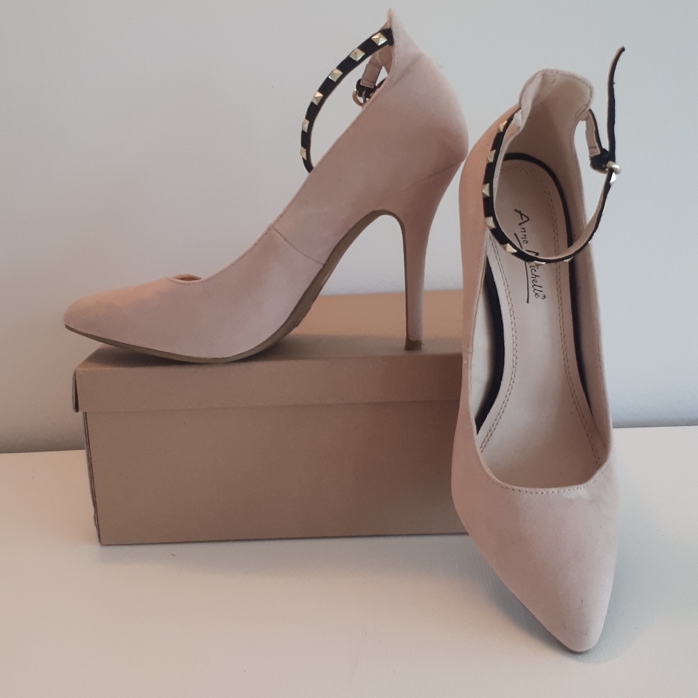 Nude heels with black studded ankle strap